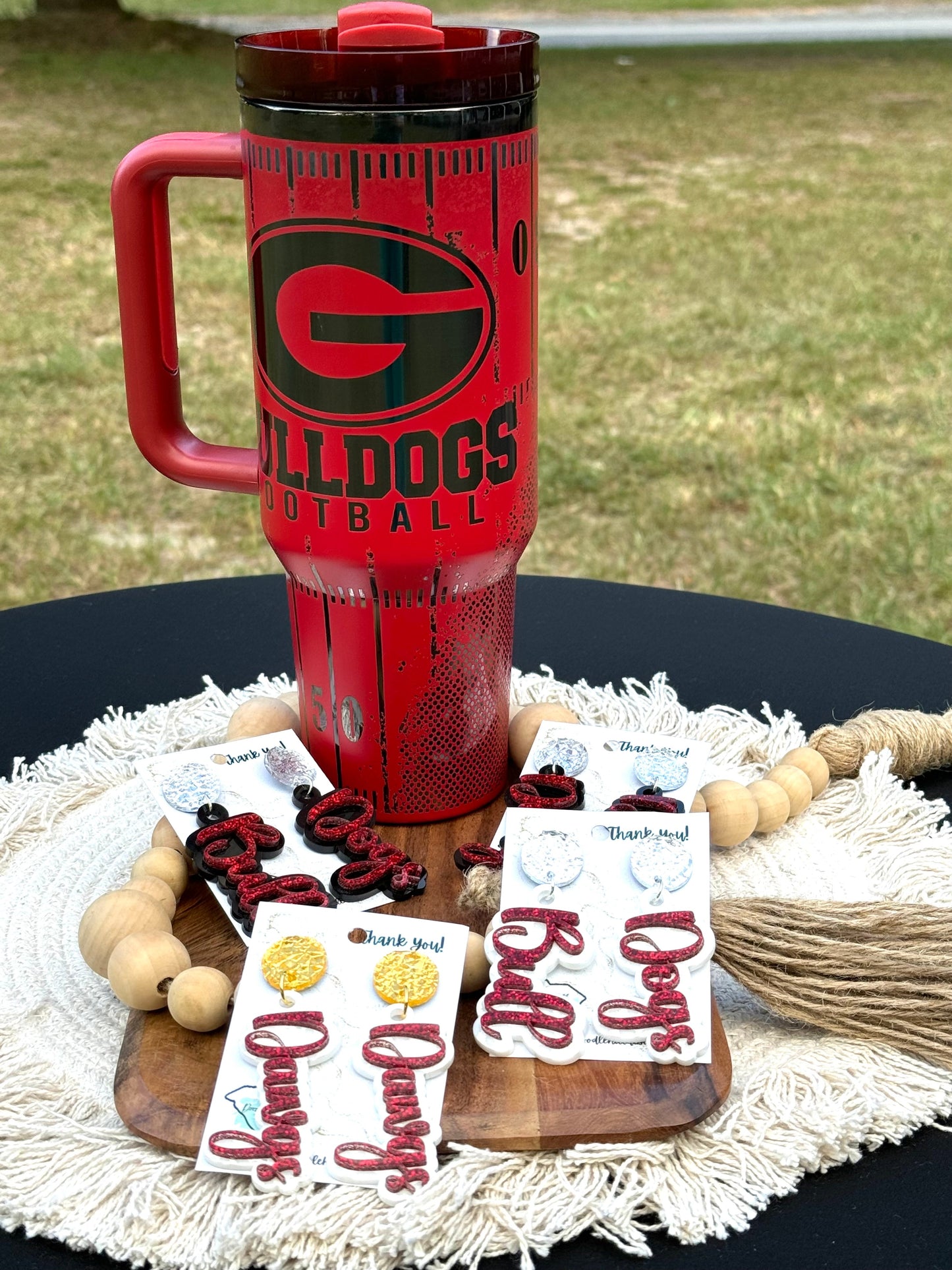 Georgia game day essentials 40 oz unbranded tumbler red with black engraving with a Georgia football theme tailgate