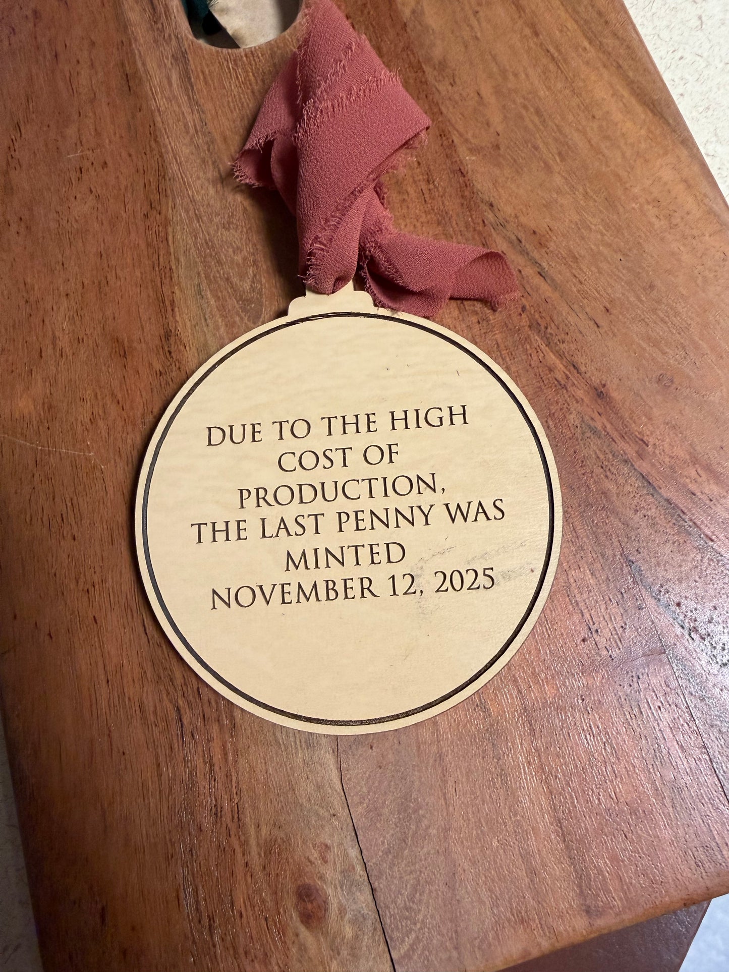 Last Penny Minted Keepsake Ornament | “In God We Trust – We Lost Our Cents” Wooden Ornament | Historic Penny Memorial Decor