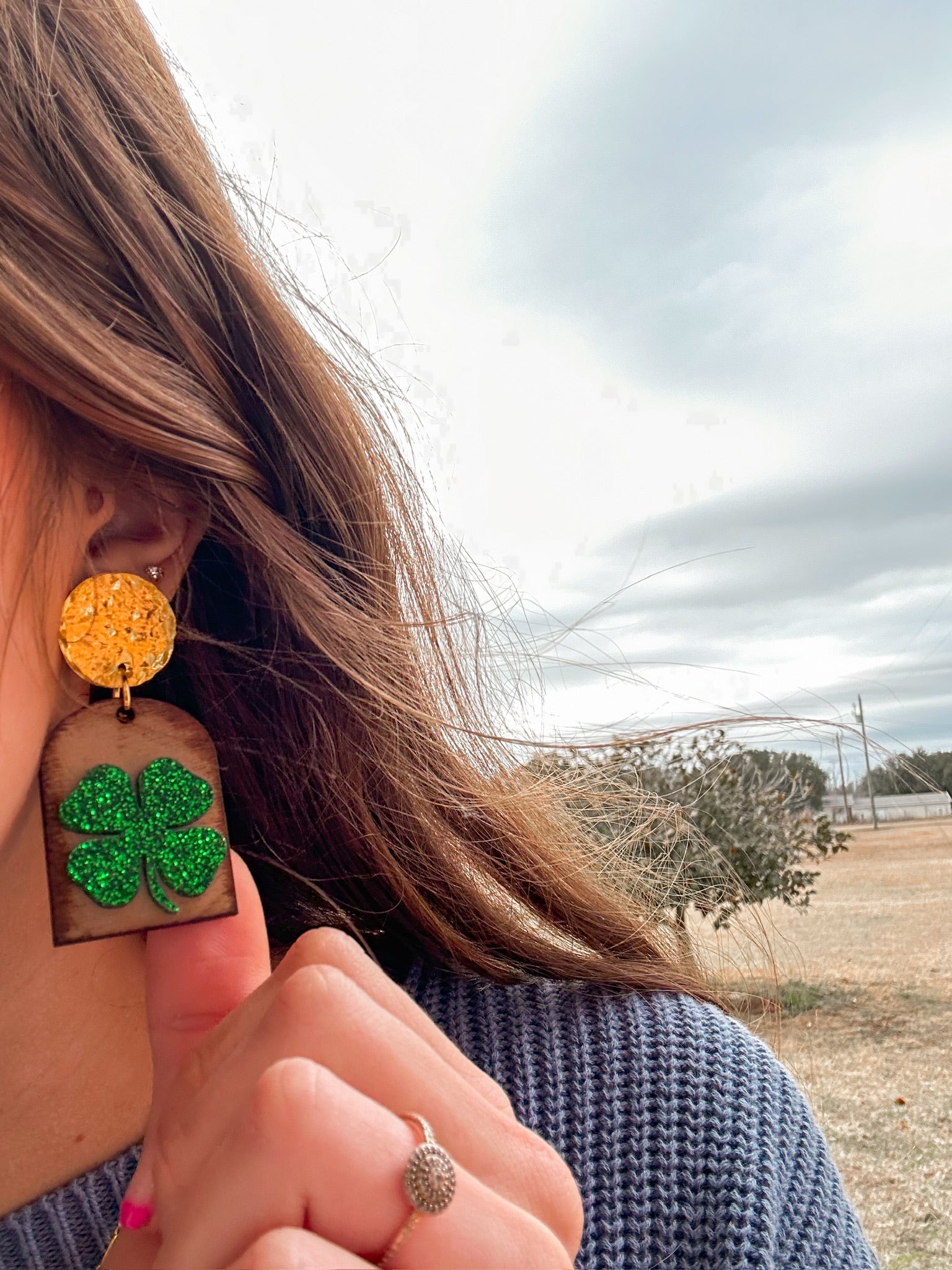 wooden arch earrigns with green glitter shamrock 