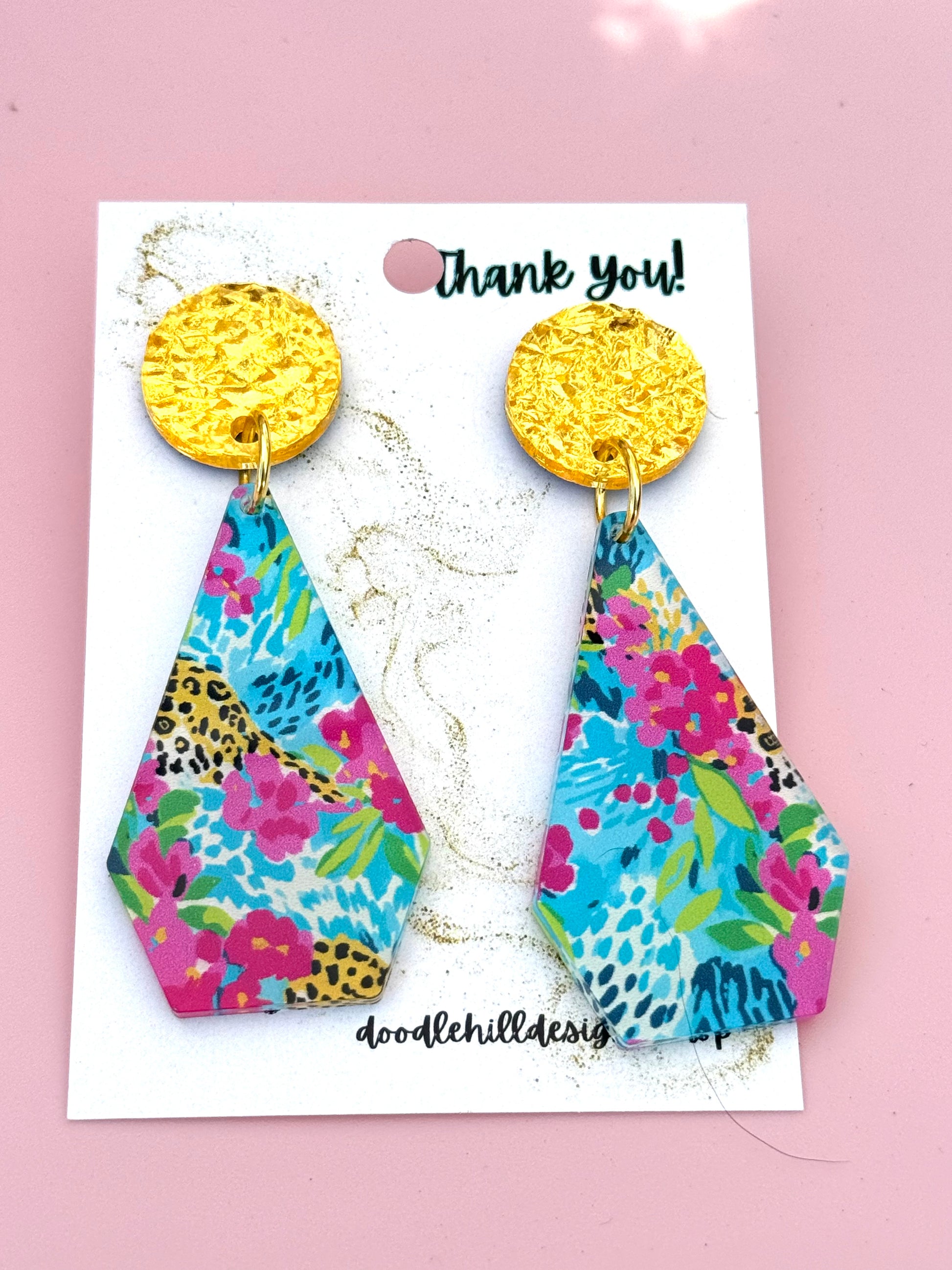 Preppy earrings with pink, lime green, and teal colors, with a sparkle of leopard. Gold textured post 