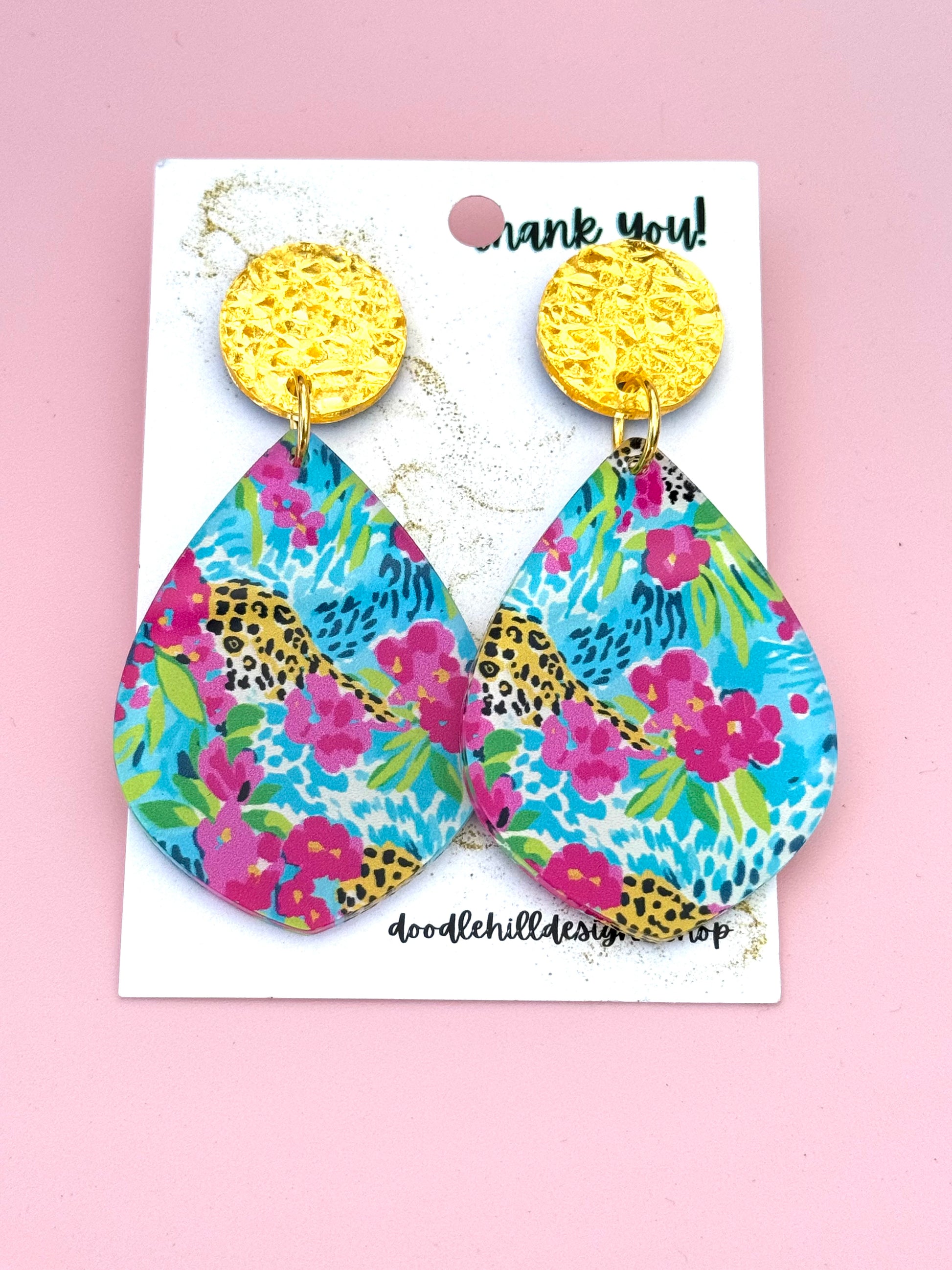 Preppy earrings with pink, lime green, and teal colors, with a sparkle of leopard. Gold textured post 