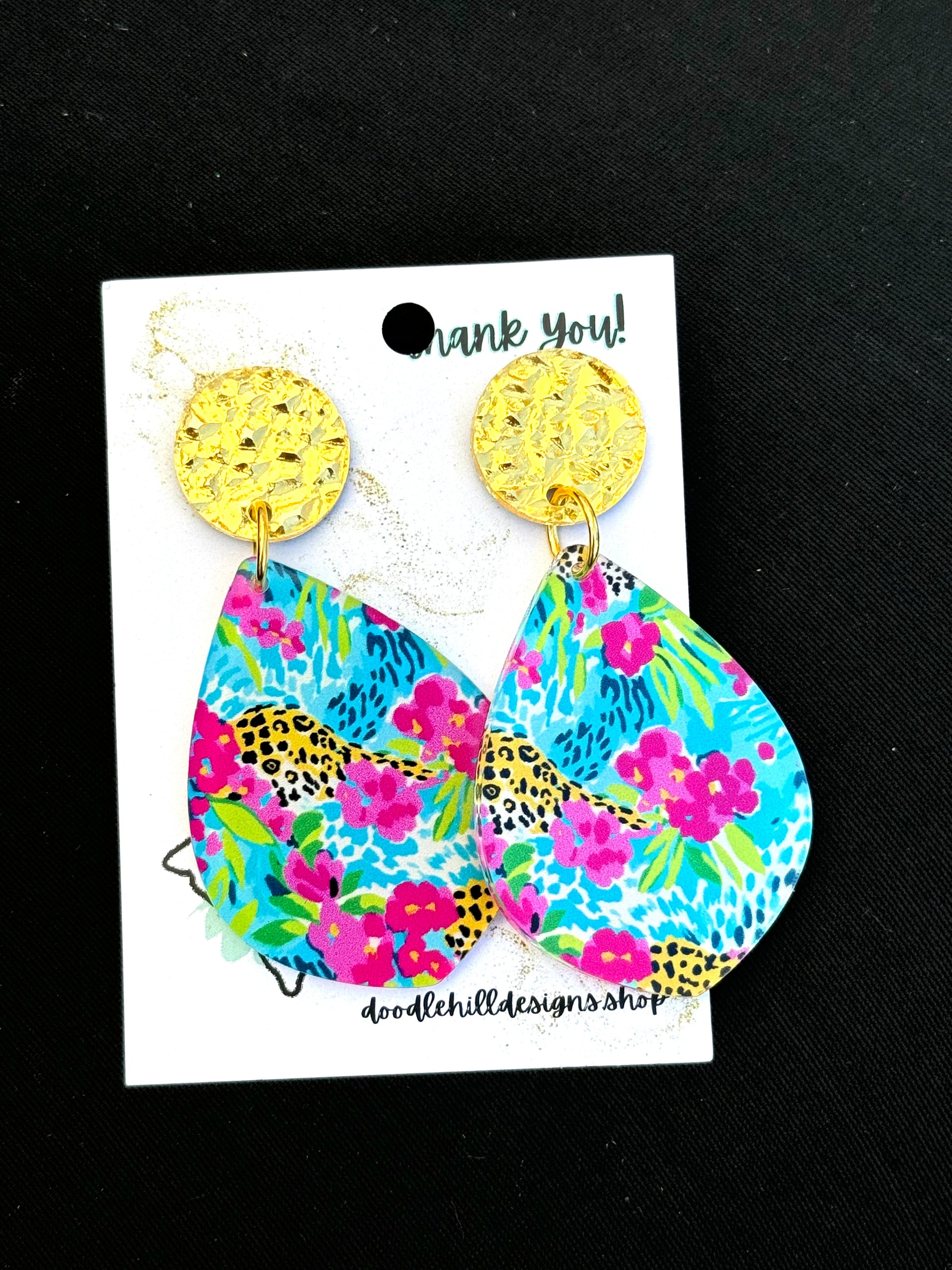 Preppy earrings with pink, lime green, and teal colors, with a sparkle of leopard. Gold textured post 