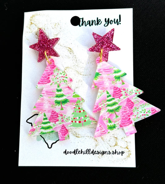 clear pastel pink and green christmas tree print with christmas tree shaped.Post are pink glitter stars 
