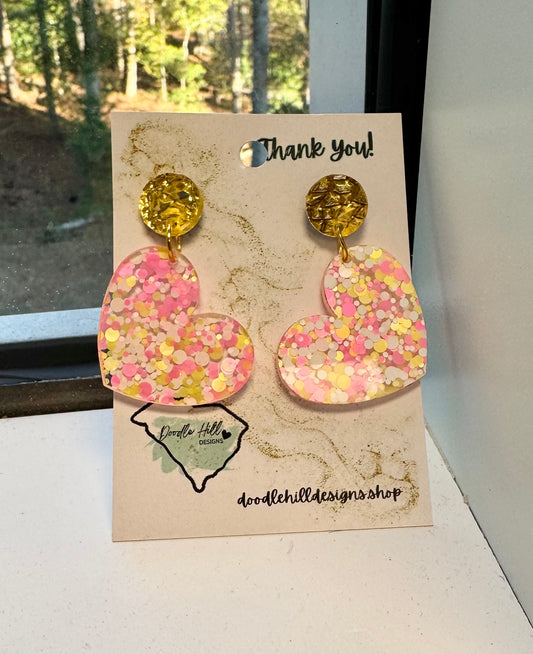 heart shaped earrings clear acrylic with gold, light pink and dark pink flakes with gold textured post 