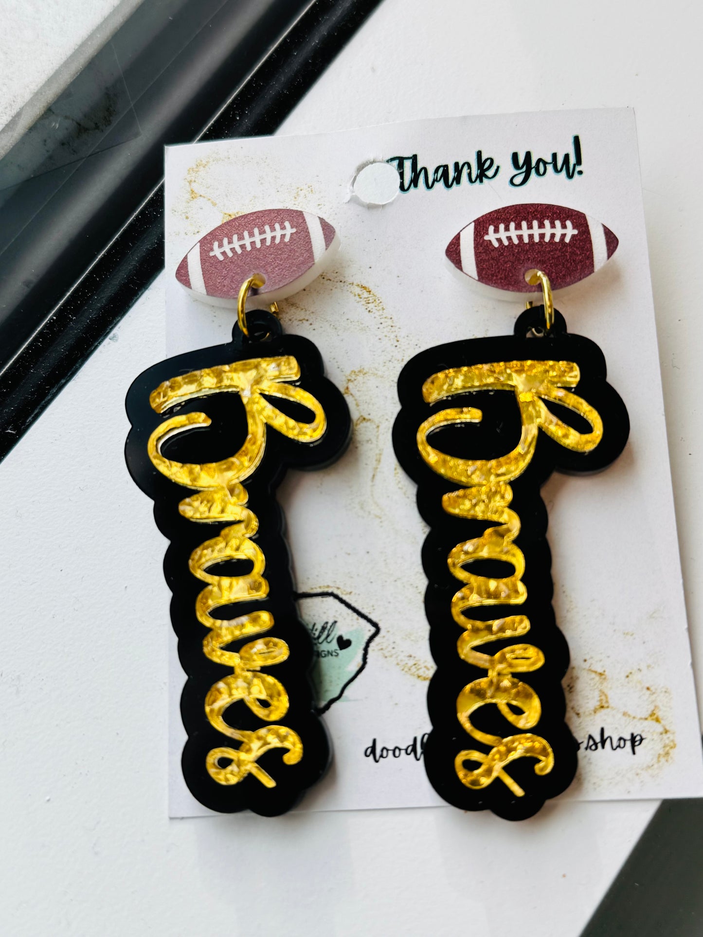 game day two tone acrylic earrings black and gold acrylic Brave earrings with football post 