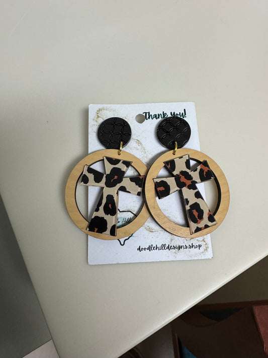 leopard cross earrings with birch circle around. Black textured post 