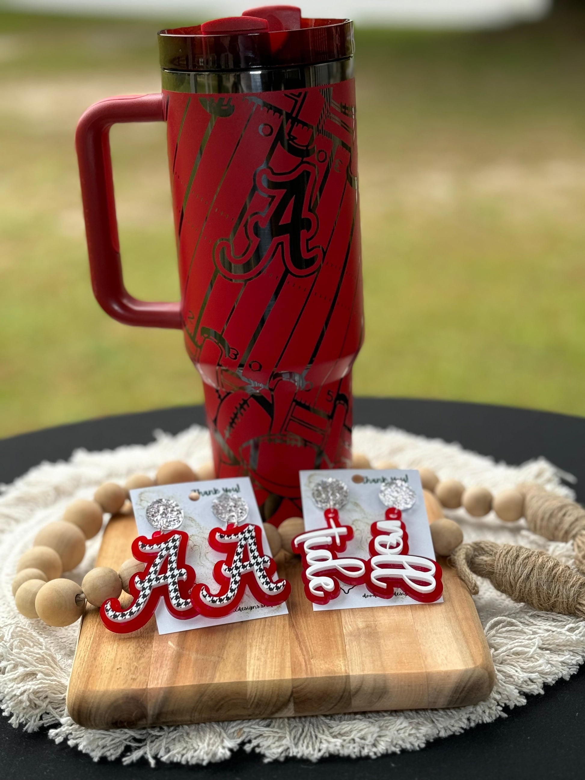 Alabama game day essentials 40 oz unbranded tumbler red with black engraving with a alabama football theme tailgate
