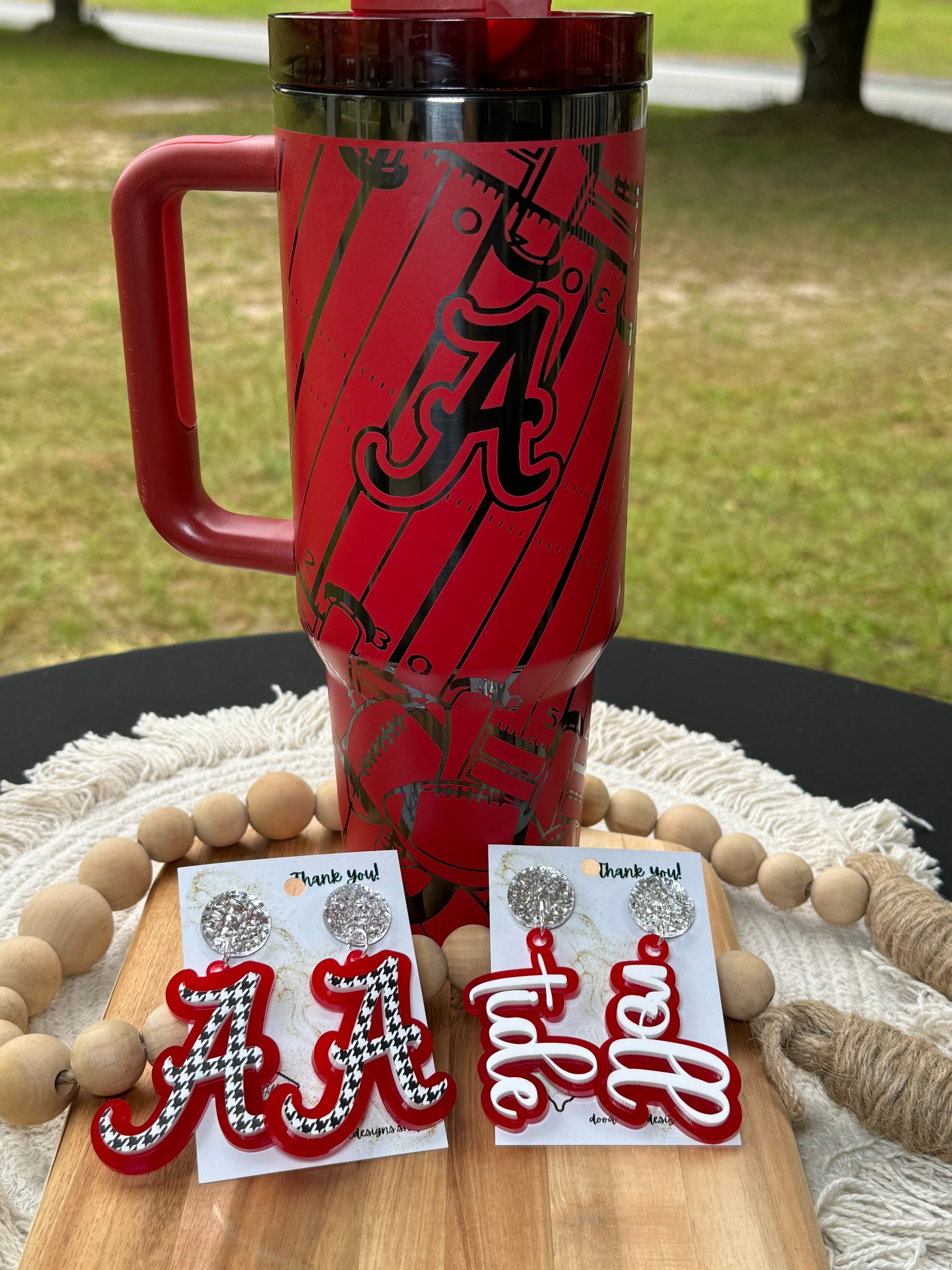 Alabama game day essentials 40 oz unbranded tumbler red with black engraving with a alabama football theme tailgate