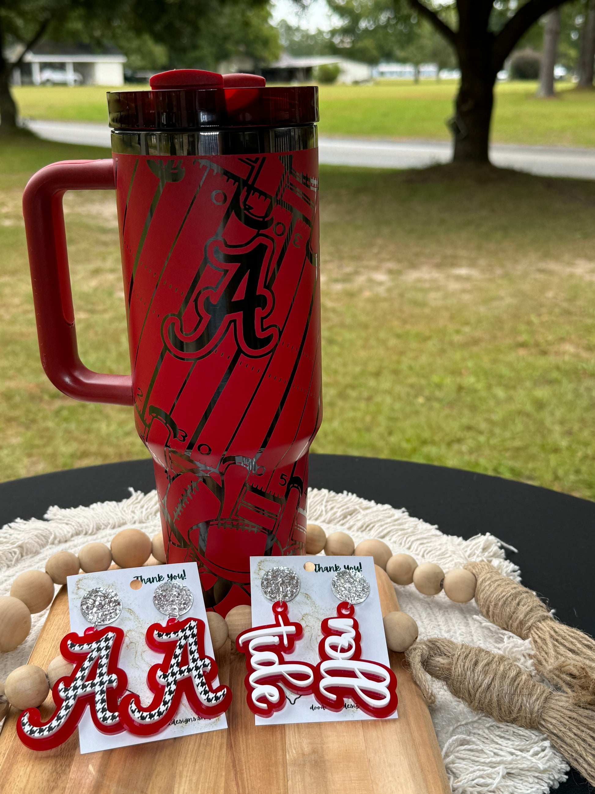 Alabama game day essentials 40 oz unbranded tumbler red with black engraving with a alabama football theme tailgate