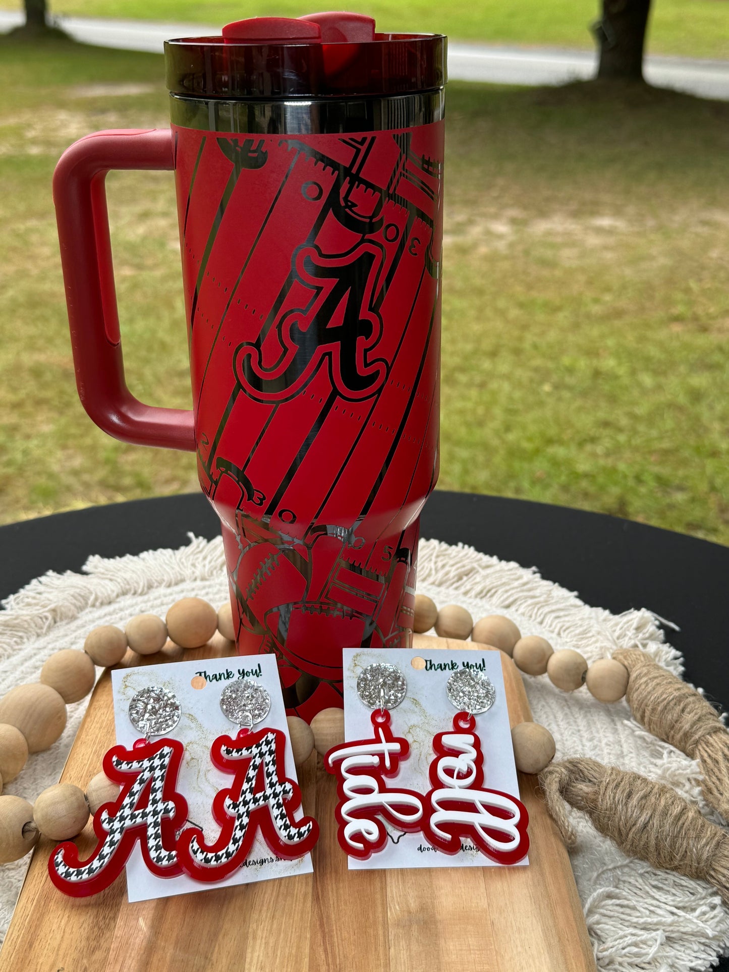 Alabama game day essentials 40 oz unbranded tumbler red with black engraving with a alabama football theme tailgate