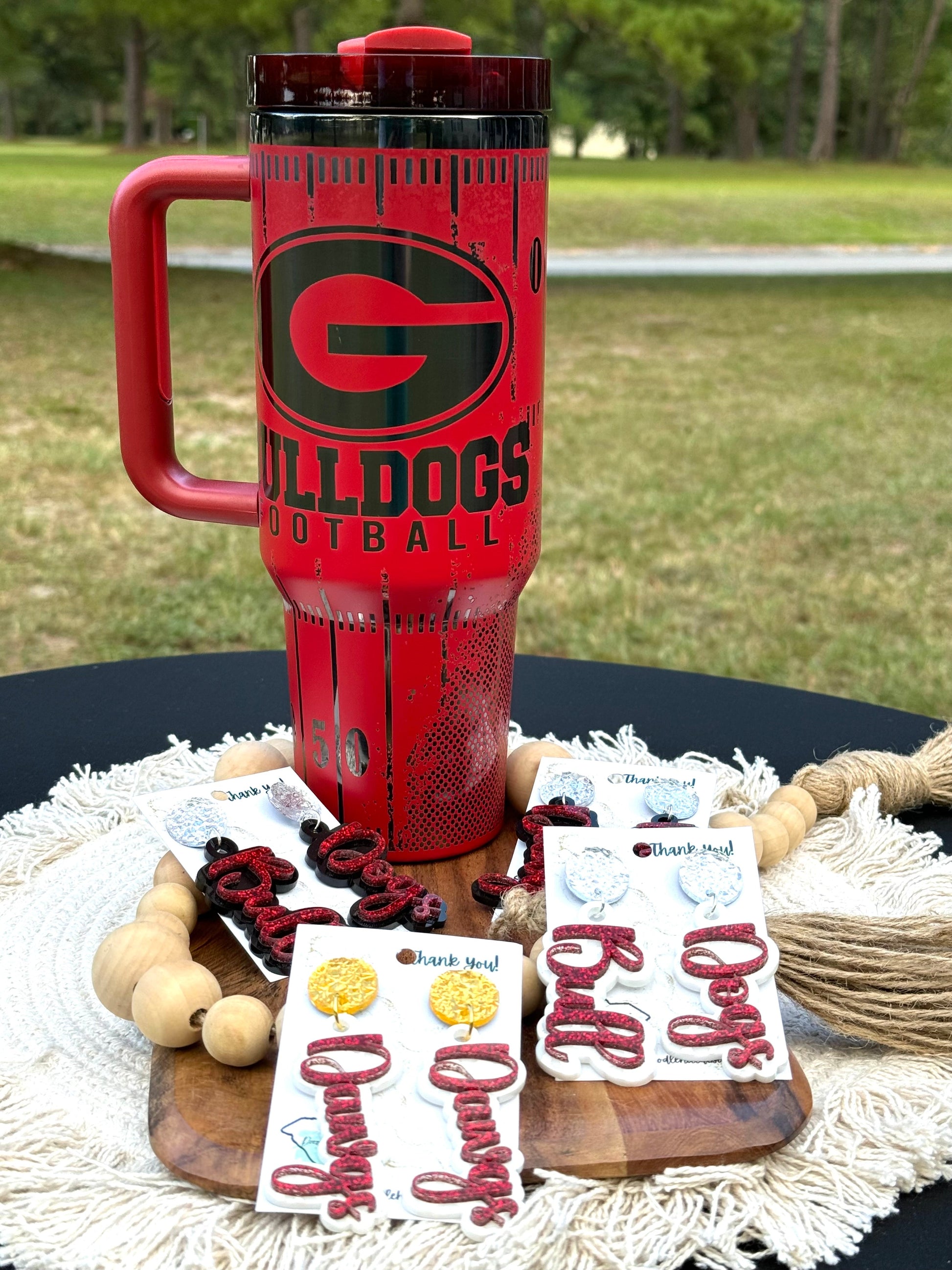 Georgia game day essentials 40 oz unbranded tumbler red with black engraving with a Georgia football theme tailgate