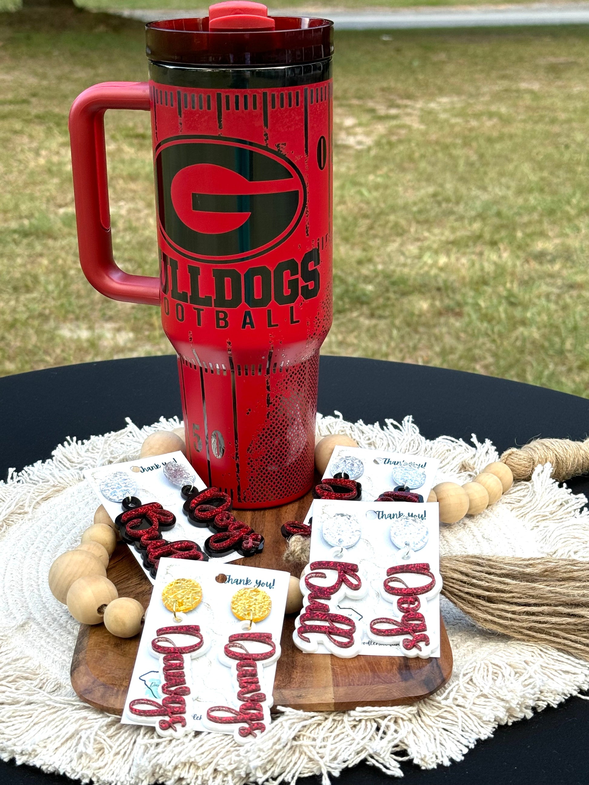 Georgia game day essentials 40 oz unbranded tumbler red with black engraving with a Georgia football theme tailgate