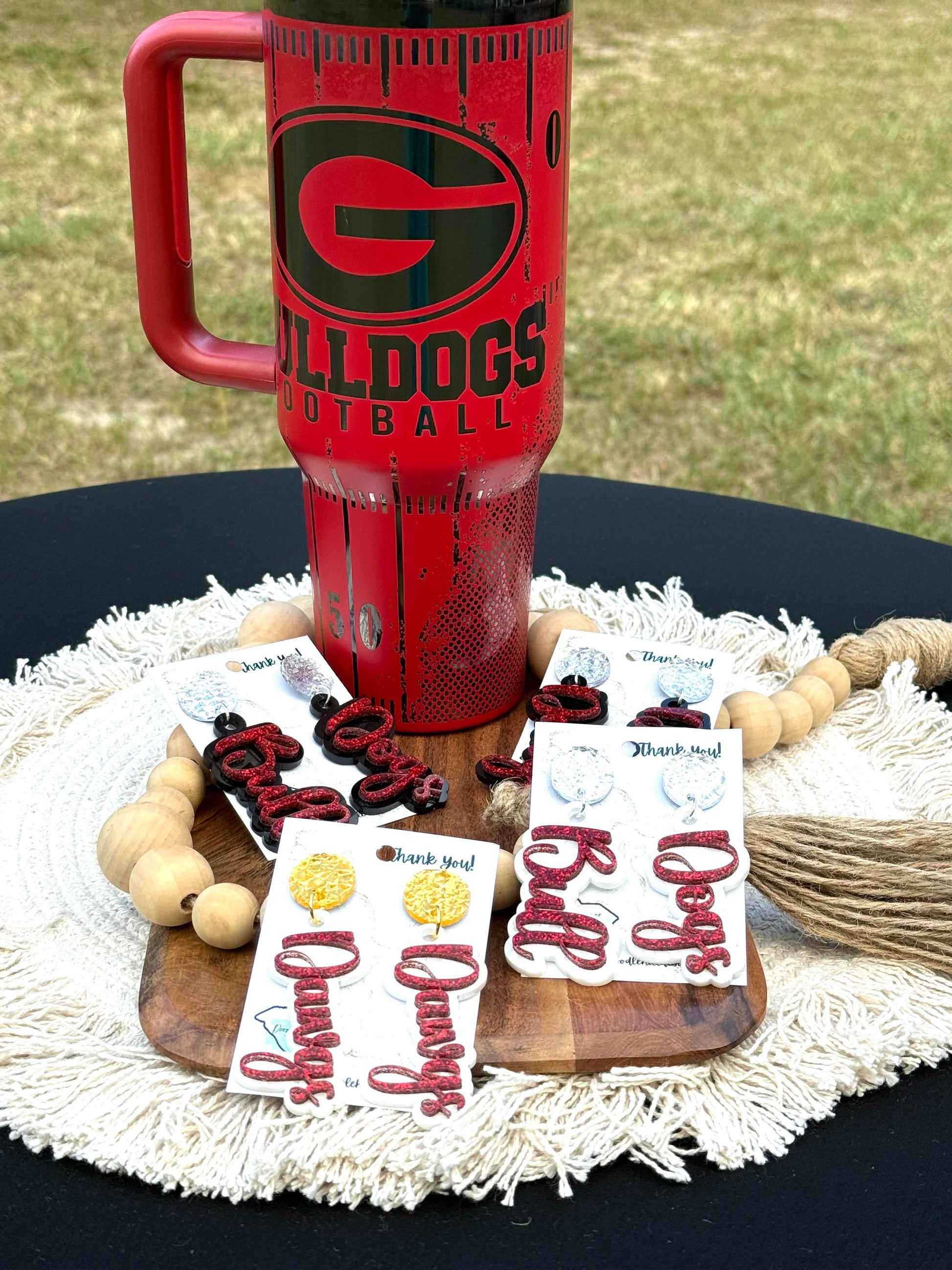 Georgia game day essentials 40 oz unbranded tumbler red with black engraving with a Georgia football theme tailgate