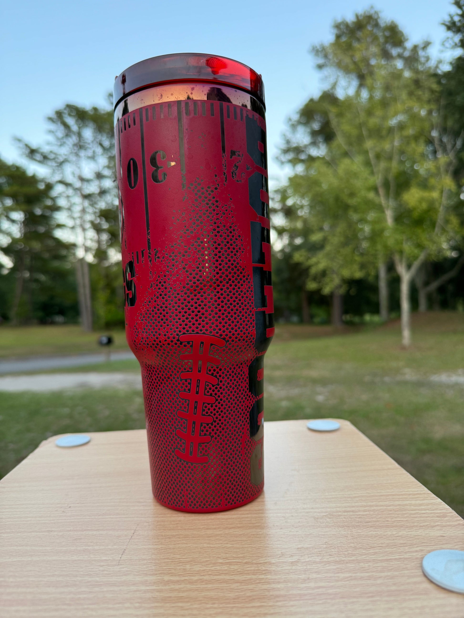 Georgia game day essentials 40 oz unbranded tumbler red with black engraving with a Georgia football theme tailgate