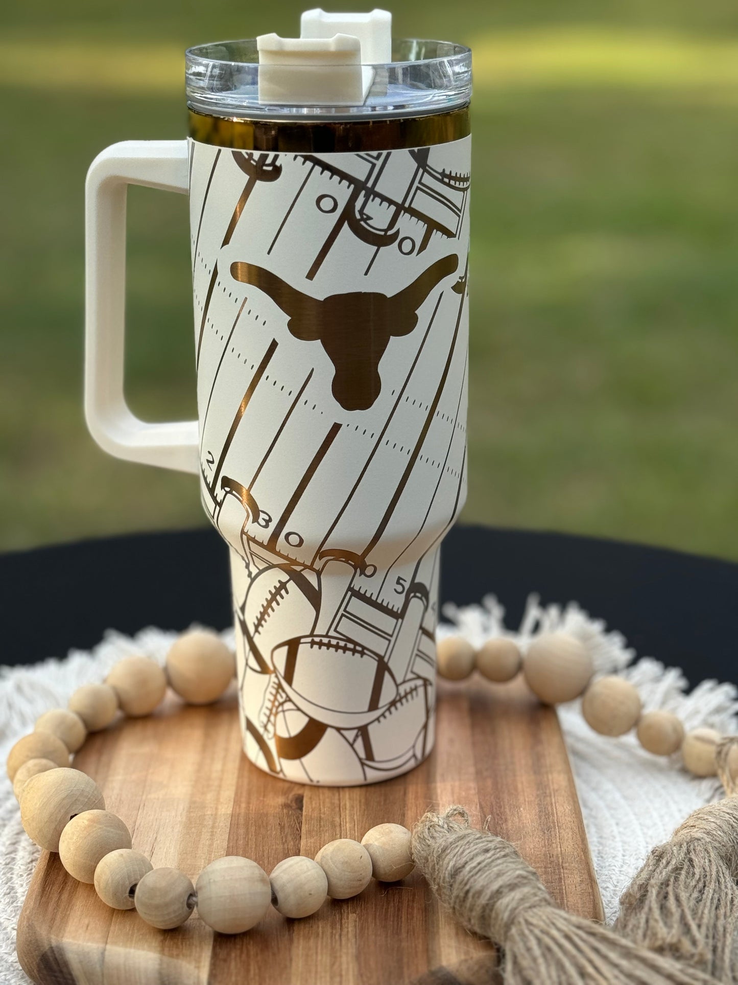 Texas longhorn game day essentials 40 oz unbranded tumbler black or white lasered engraved with a Texan longhorn